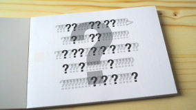 Question marks on the page